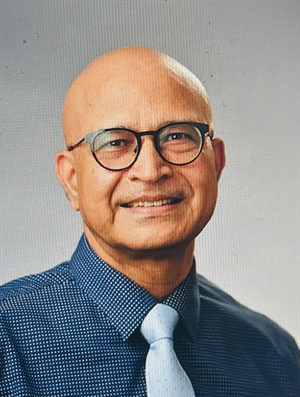 Tarun Sharma, MD, FRCSEd, MBA, FASRS